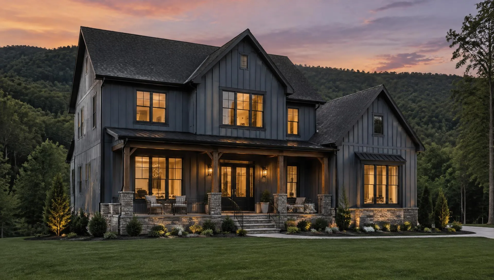 Finished blue-gray board and batten home at dusk